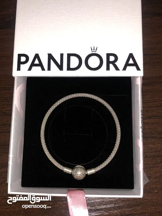 PANDORA bracelet, for sale, plus two charms as a gift. price for all 60 dinars