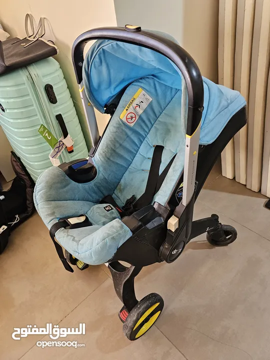 baby walker and doona stroller