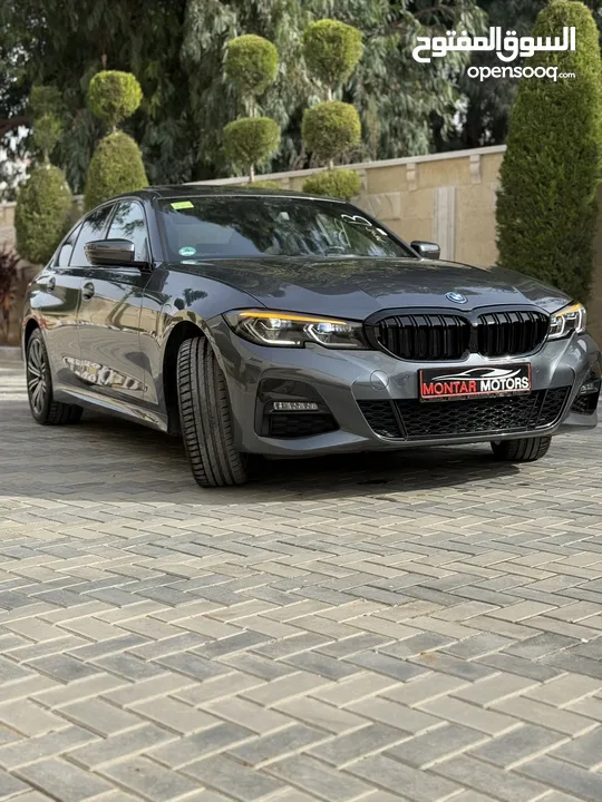 ترخيص 2022 BMW  330e  محرك 2000 هايبرد plug in/يقطع على الشحنه 50 كيلو متر  297 حصان