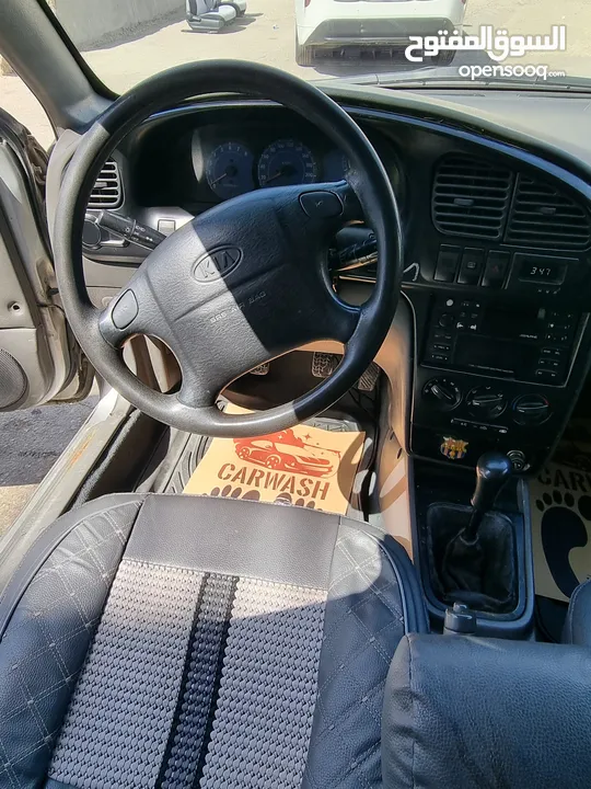 كيا سبيكترا 2001 بسعر 2400 جير عادي سياره نظيفه جدا  kia spectra 2001
