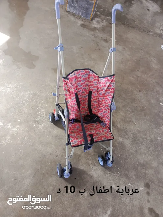 عرباية اطفال ودراجة كهربائية