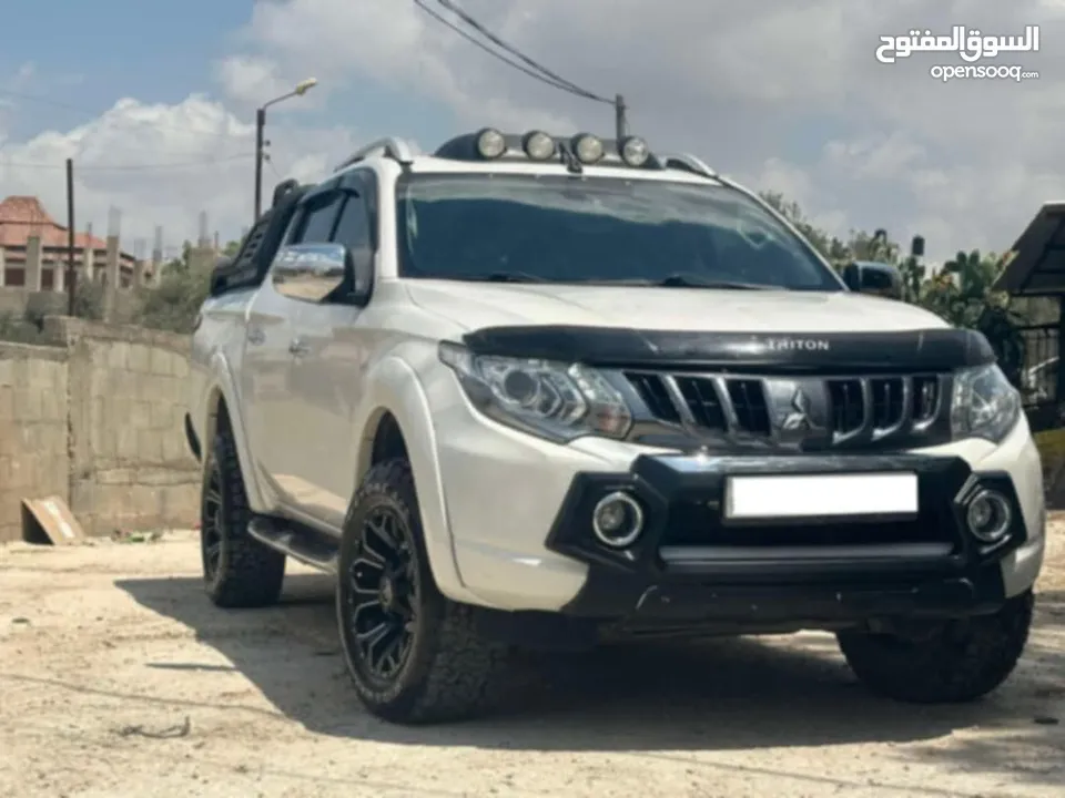 ميتسوبيشي هنتر 2019 اوتومات ديزل 4*4 فل اضافات نخب