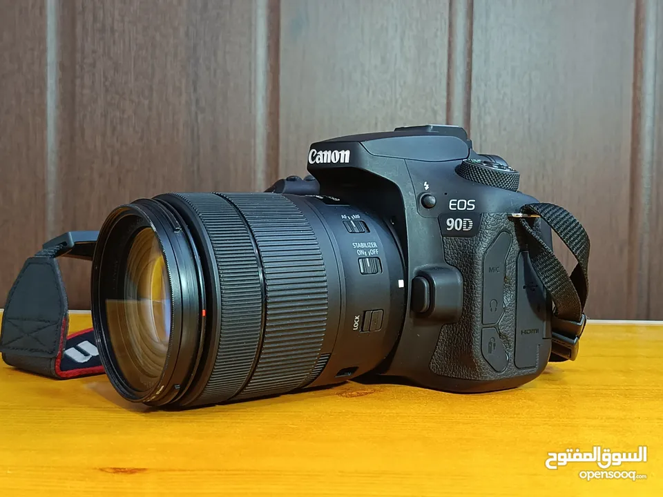 Camera Canon D90 with 18-135mm lens