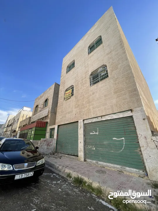 عمارة خمس شقق ومخزنين للبيع بسعر مغري