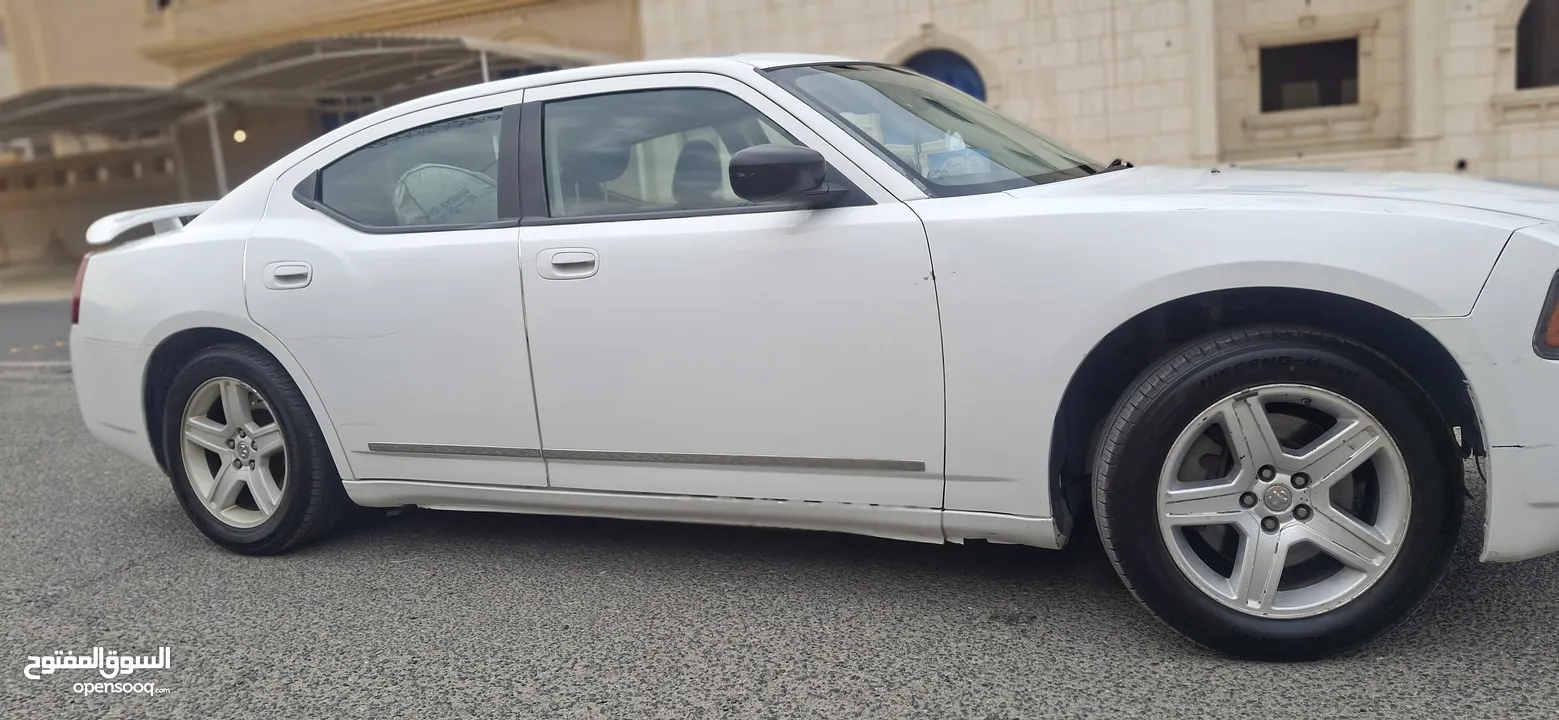 2 Dodge Charger v6.2010. Both Good Condition. Neat and Clean. Red 190k km.White 240k km..