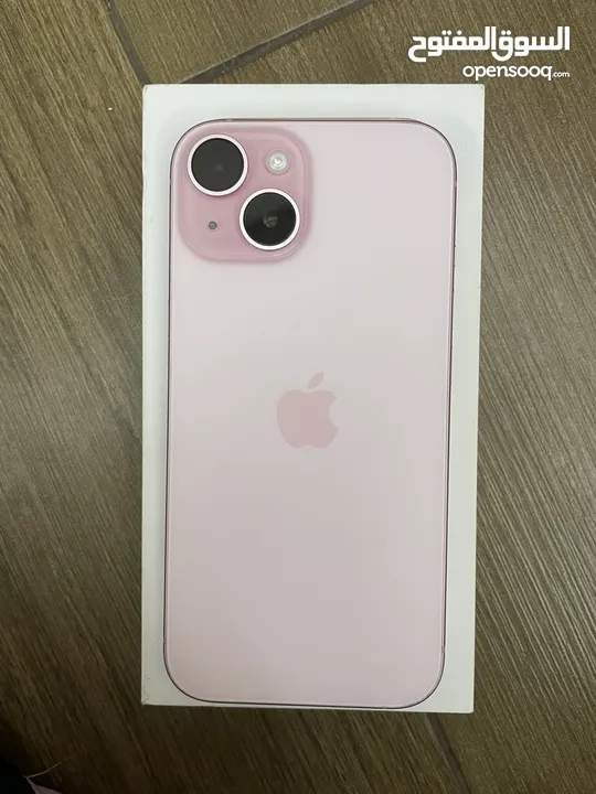 iPhone 15 pink 128GB Excellent  condition with 6 cases