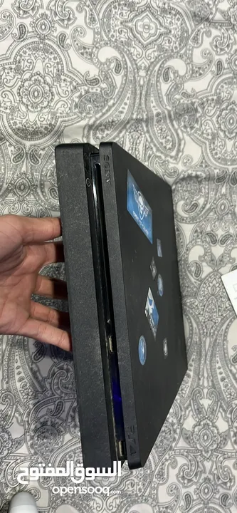 Ps4 with two controllers and 4 games including overwatxh ultimate edition