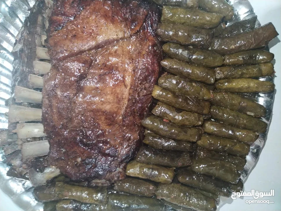 خروف مشوي او محشي او محشي ورق عنب دوالي