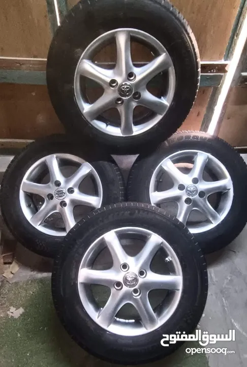 TOYOTA RIMS FOR SALE FOR COROLLA YARIS ECHO TERSEL NEAT AND CLEAN WITHOUT ANY SCRATCHES