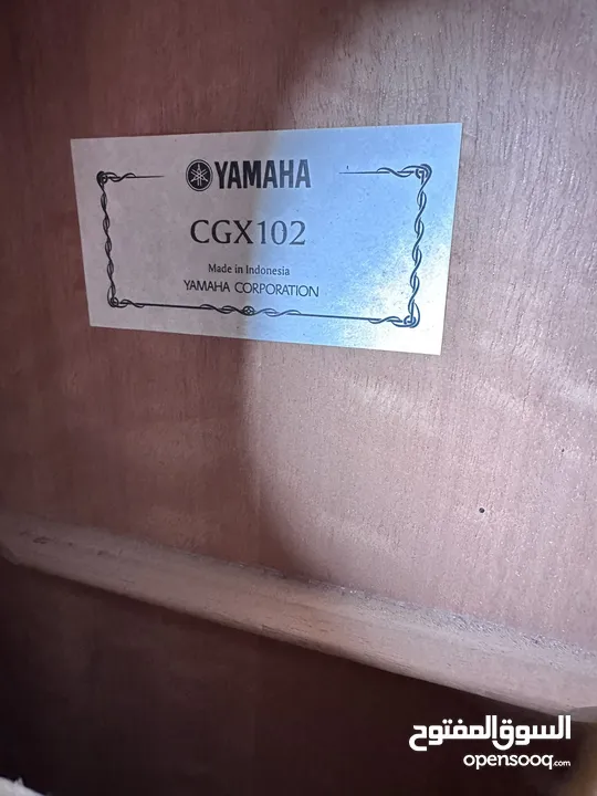 Yamaha CGX102 Plugged Classical Guitar with hardcase – 350 JDs