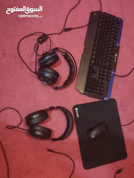 keyboard and mouse and 2 headsets