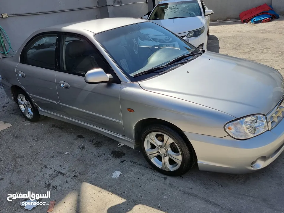 كيا سبيكترا 2001 بسعر 2400 جير عادي سياره نظيفه جدا  kia spectra 2001