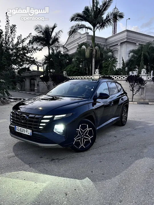 توسان ان لاين هايبرد بلج ان فل مسكر