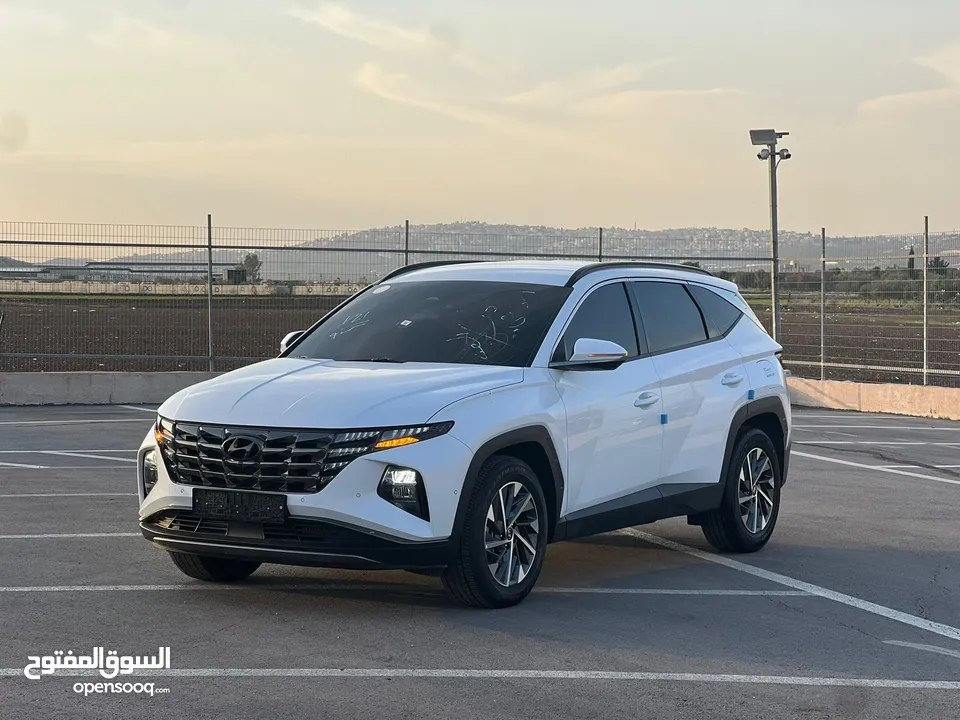 هونداي توسان /2022 فل الفل بدون فتحة سقف  2x4 ///240Hp بنزين + كهرباء  ( Haybrid) 1600cc