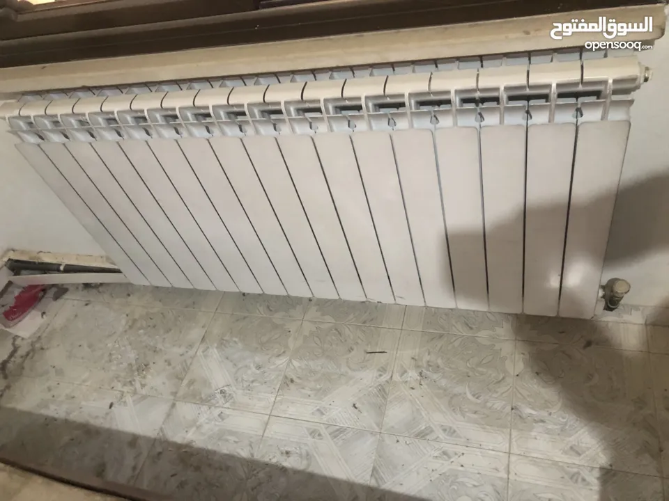 ماطور تدفئة مركزية مع خزان سولار مع الراديترات (المشعاعات)