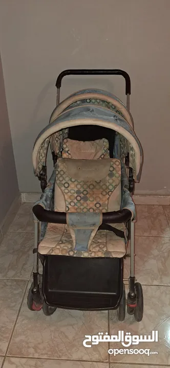 عربة أطفال توأم مستعمل بحالة جيدة  ماركة MAMA LOVE
