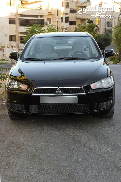 ميتسوبيشي لانسر 2016 ممشى 59 الف كيلو فحص كامل سبعة جيد ولا ملاحظة