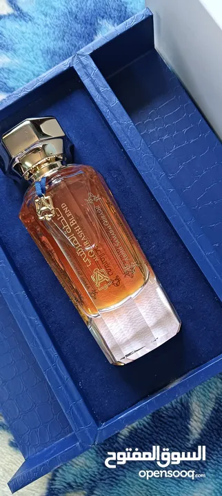 عطر خلطه القرشي جديد90مل للرجال والنساء  مع ستاند خشب لون ازرق