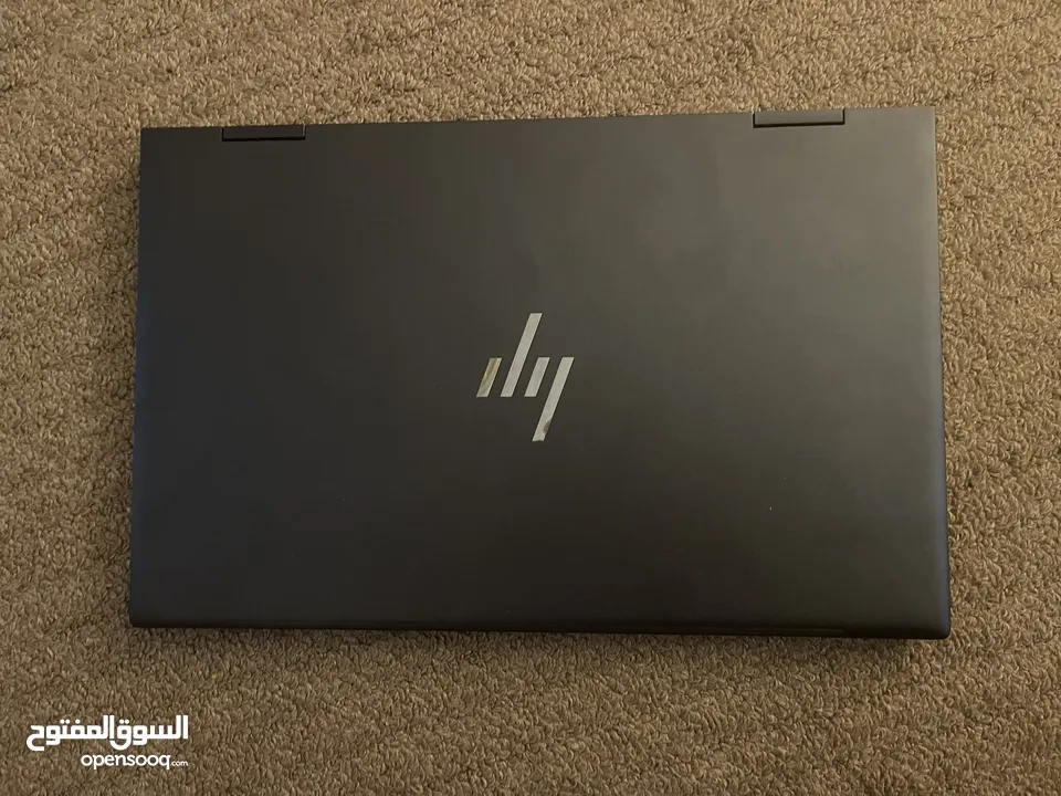 لابتوب أمريكي قابل للطي مع شاشة لمس شبه جديد مستعمل لتسعة اشهر فقط مع شاحن و ماوس هدية