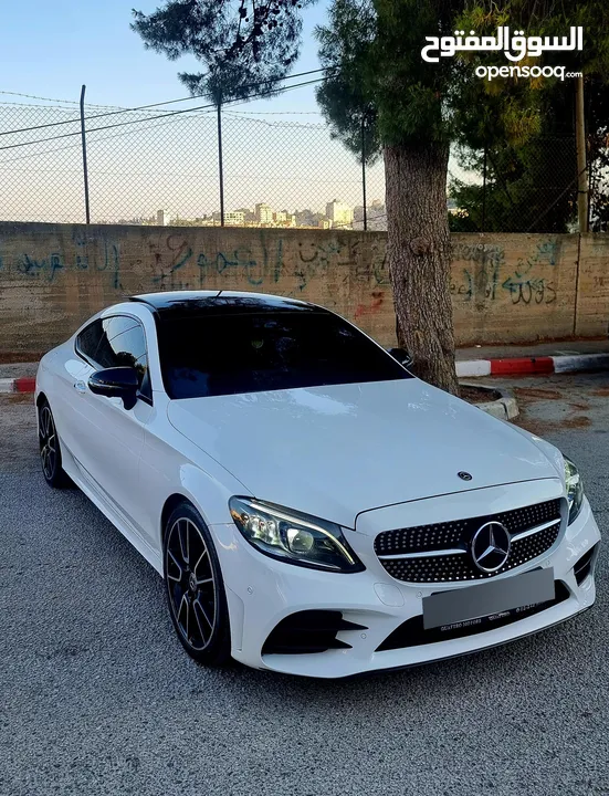 مرسيدس C300 2020/ فل مسكر بانوراما عداد ديجتال فرش عسلي / ولا جرام بويا / بالكررراتين وكالة