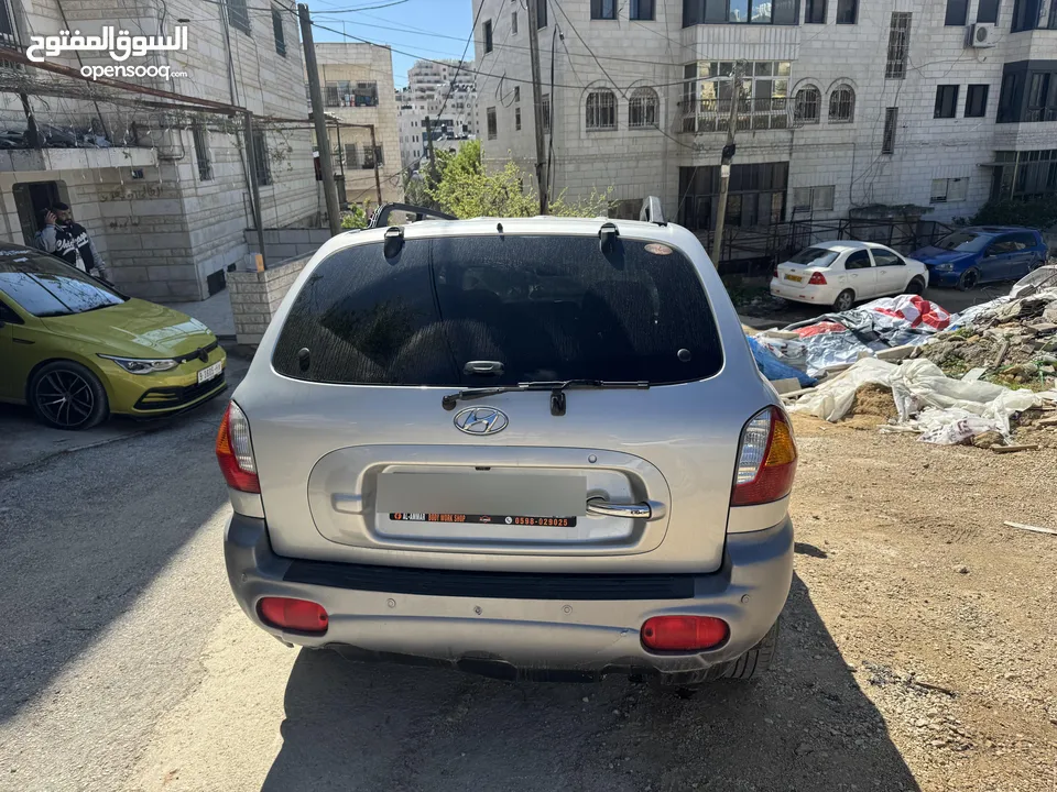 هيونداي سنتافيه فل اضافت ماعدا فتحة 7 ركاب اتوماتيك ديزل موديل 2002 فحص 100٪؜ خالي من المشاكل