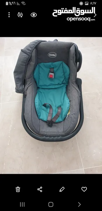 كرسي طفل مع حامل طفل
