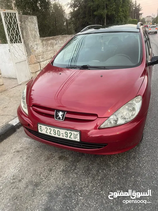 بيجو 307 2005  مطور2000 100% مكنيكيات الف الف دهان جديد مزجان حامي بارد منفوضة من النمرة ل النمرة