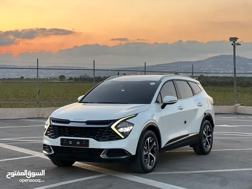 كايا سبورتاج /2022 فل بدون فتحة سقف  2x4 ///240Hp بنزين + كهرباء  ( Haybrid) 1600cc