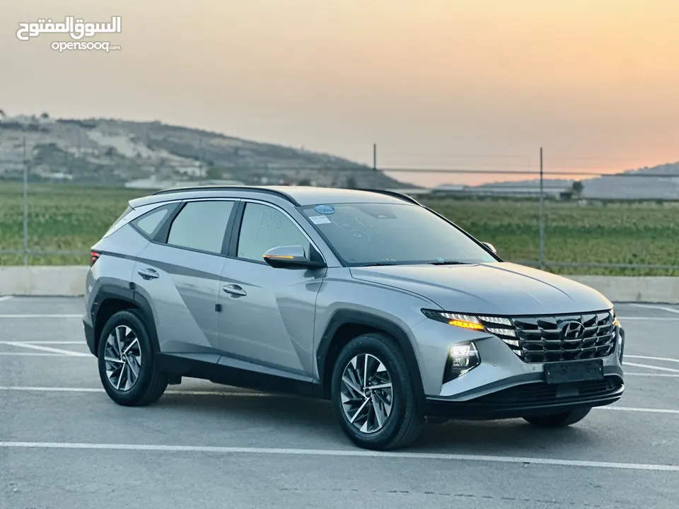 هونداي توسان 2022 فل بدون فتحة سقف  2x4 ///240Hp بنزين + كهرباء  ( Haybrid) 1600cc
