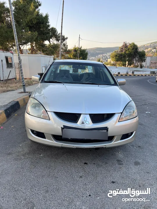 ميتسوبيشي لانسر 2006 وارد لكويت للبيع كاش