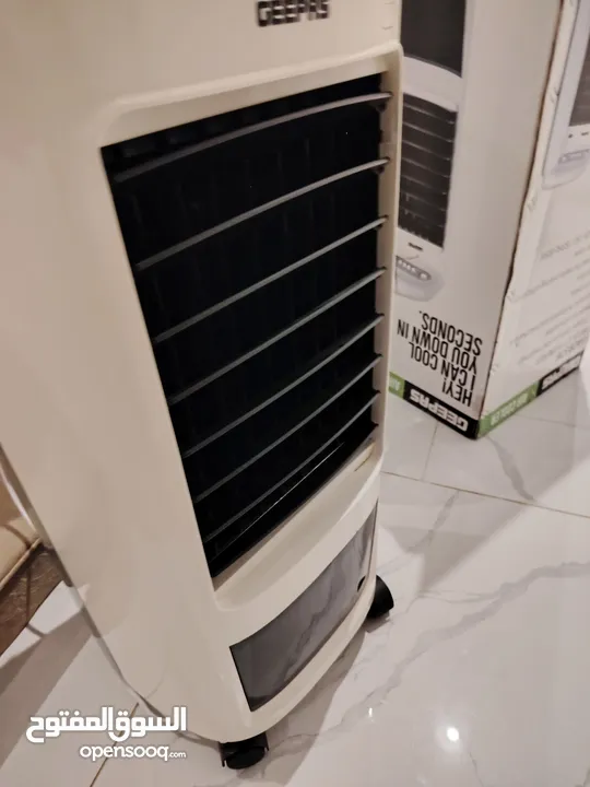 مبرد هواء من نوع جيباس - اير كولر - يعمل بحالة ممتازة حجرة ثلج وماء 7لتر  مع قطعتين Ice box