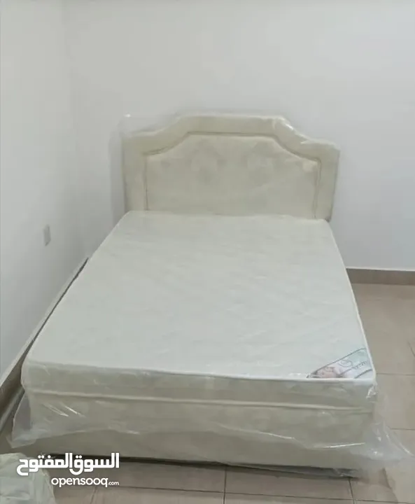 Bed with mattress on wholesale price delivery with extra charges according to the location