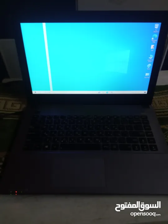 لابتوب asus i5جيل رابع ع رام 8وهارد 700gb في حز بشاشة ع200