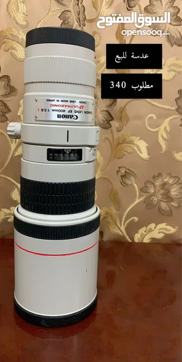 عدسة كانون 400mm  للبيع   Canon 400mm lens for sale only, negotiable