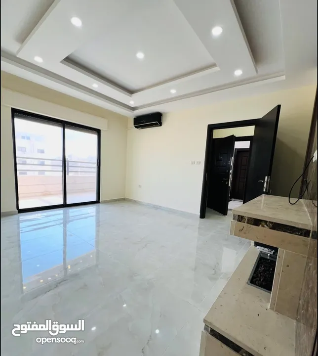 شقة جديدة للبيع ب حي المنصور طابق ثاني 170 متر مطله على شارع ياجوز وشارع الأردن راكب مطبخ ومكيفات