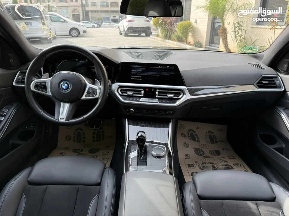 ترخيص 2022 BMW  330e  محرك 2000 هايبرد plug in/يقطع على الشحنه 50 كيلو متر  297 حصان