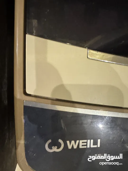 غسالة أوتوماتيك نوع weili تغذيه علويه 7 كيلو مش مصديه بحاله ممتازه استعمال خفيف جدا