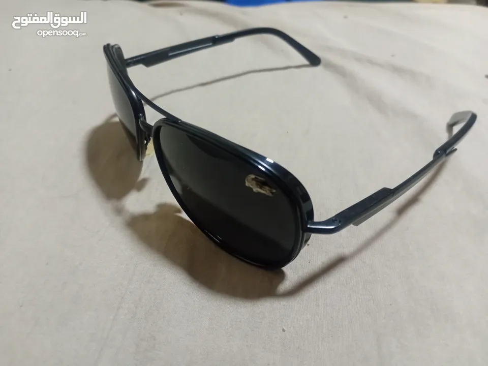 نظارة لاكوست استخدام خفيف  أصلية بحالة ممتازة