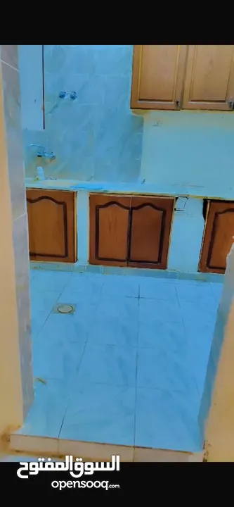 شقه ارضيه مع حديقه للبيع