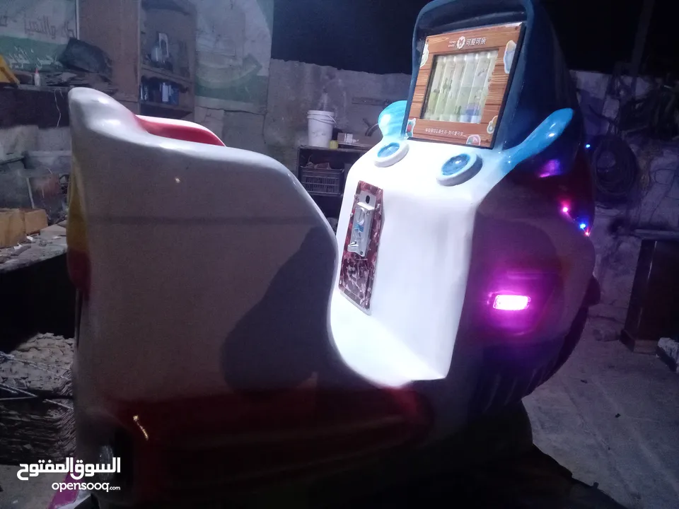 لعبه هزازة كهربائيه تعمل على العملة المعدنيه