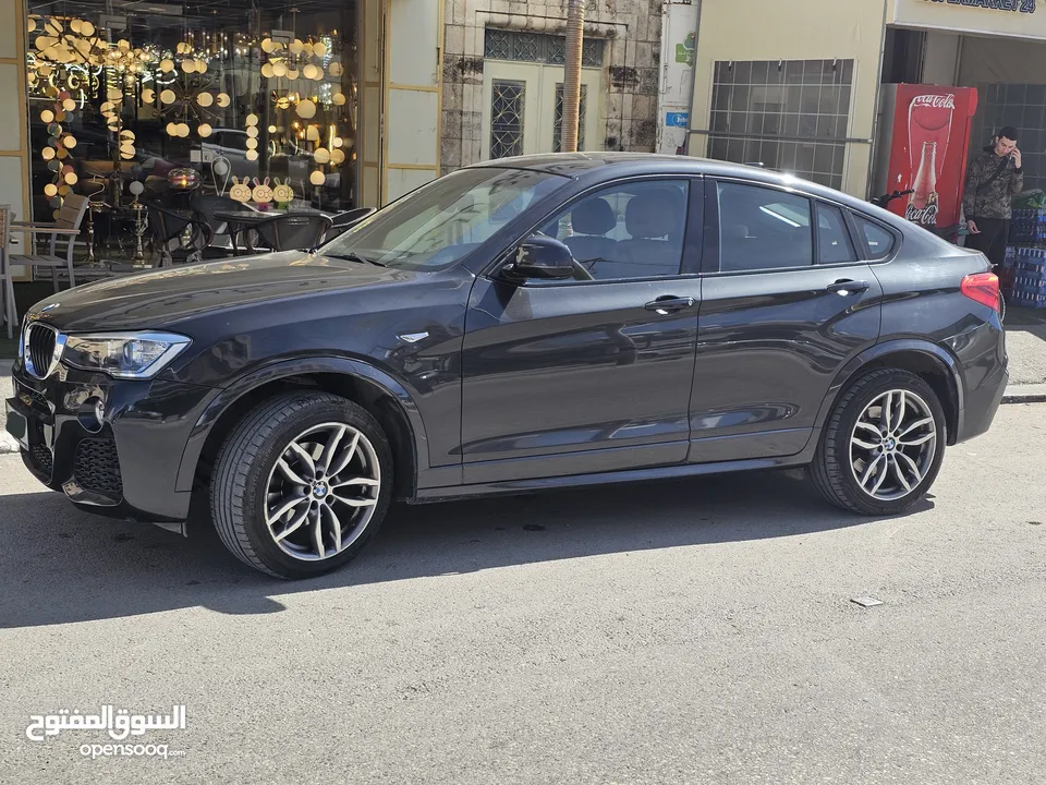 BMW-X4M(FULL OPTION) FULL WHEEL   TWIN TURBO-V6 ENGINE , DRIVE(4x4) استيراد ألماني ، يد اولا .