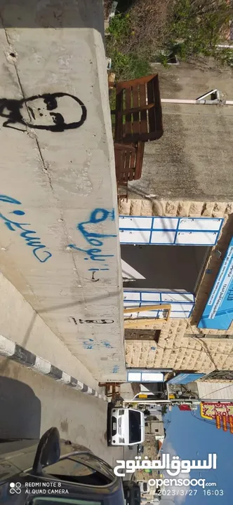 ارض مع عقار تجاري للبيع