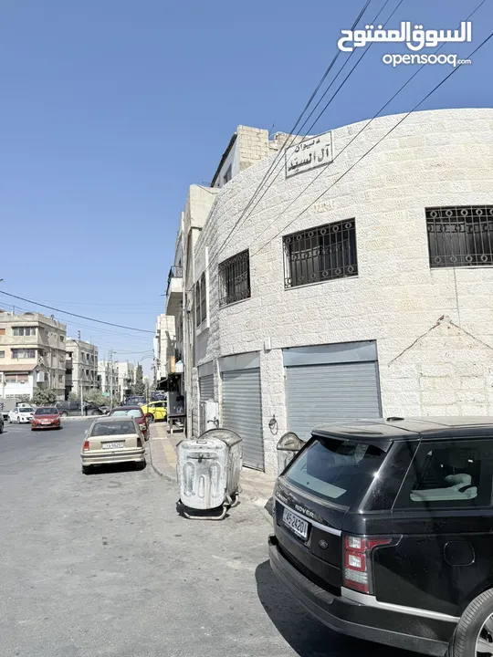 عمارة خلف الاستقلال مول بأول سوق النزهة الشعبي