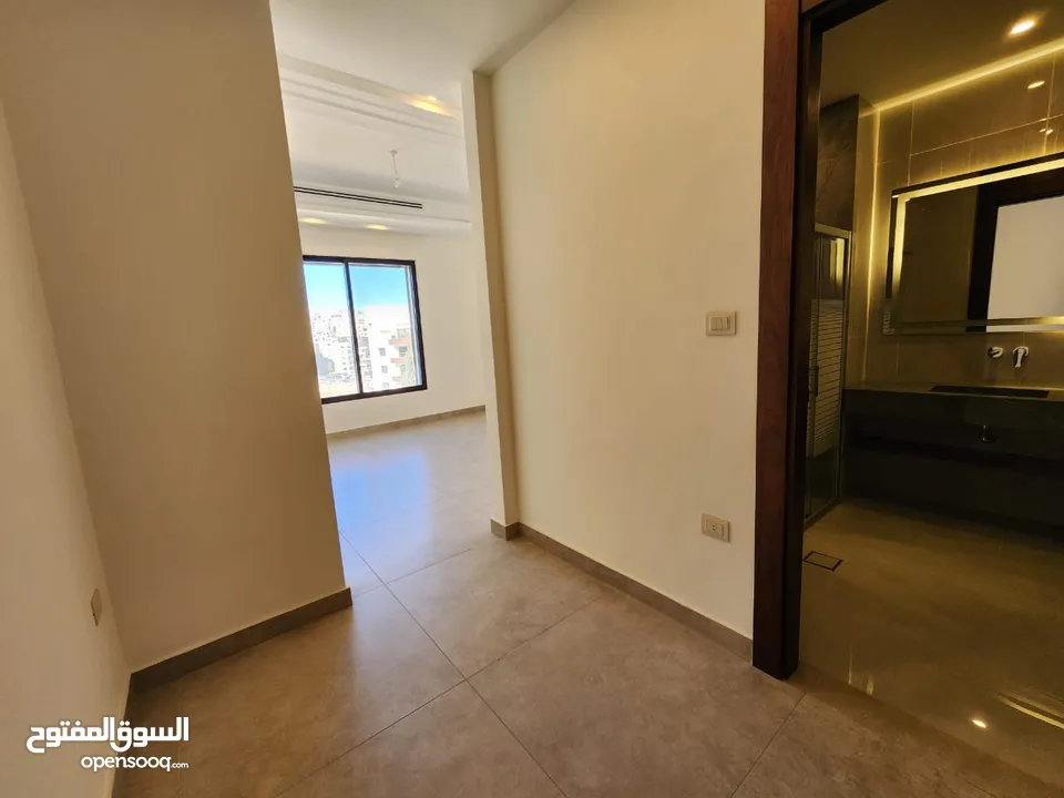 شقة طابقية فاخرة للبيع في عبدون  ref : 14389
