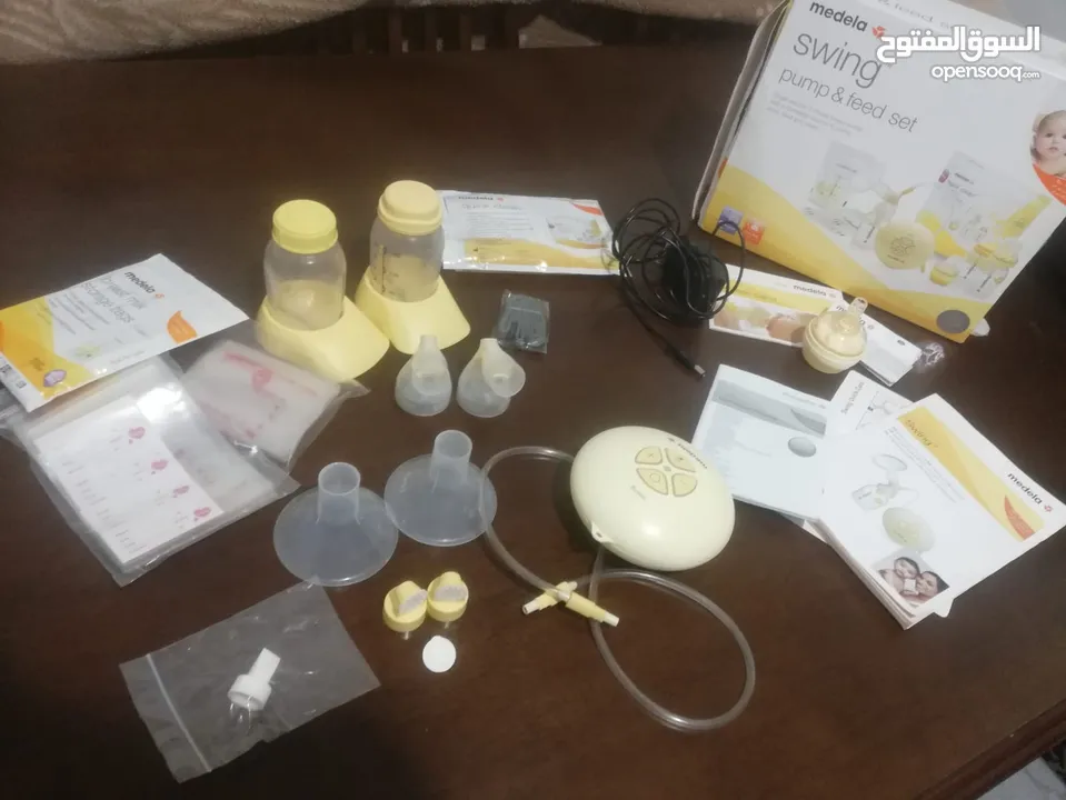 Medela Swing Single Electric Breast Pump with extra pieces جهاز شفط حليب