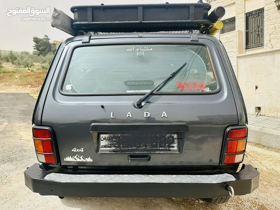 لادا أوربان 2019  مجهزة تجهيز كامل للرحلات والتخييم والصيد سيارة قوية وعملية بحال الوكالة