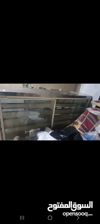ثلاجة عرض معجنات وكيك بلعبكي بحالة الوكالة  ماكينة تقطيع توست بحالة الوكالة  صاج قطايف صب  خفاقة قطا