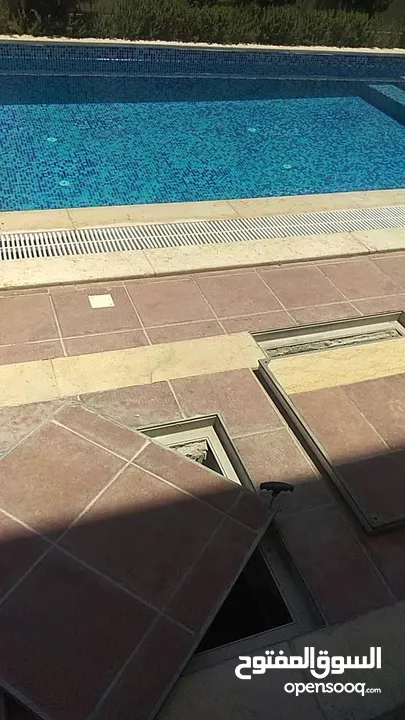 بناء برك سباحة والبيوت الريفية وشلالات والاسوار تشيك الأراضي وبناء الشاليهات تنسيق الحدائق شلالات