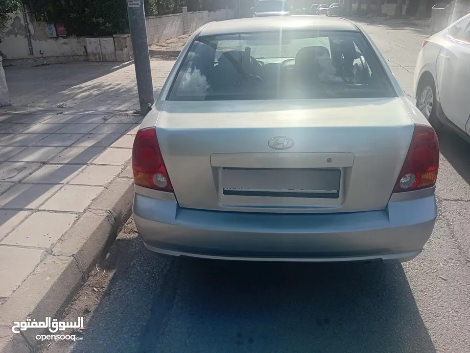 هونداي فيرنا لون سلفر موديل 2004 مرخصة  فحص 4 جيد للبيع بشكل مستعجل