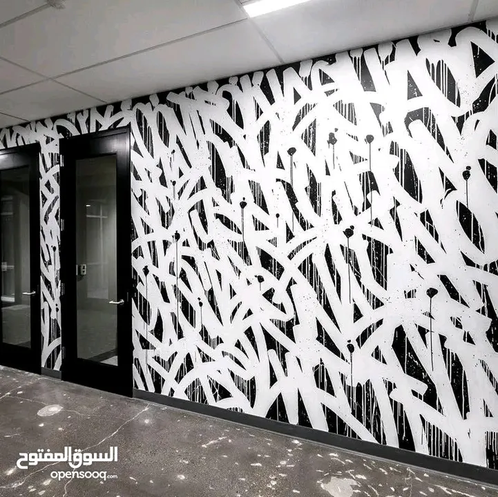 رسام علي الجدران mural art